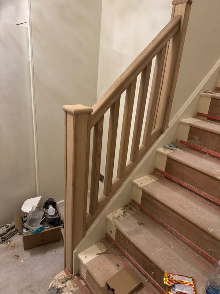 New oak staircase balustrade during fitting